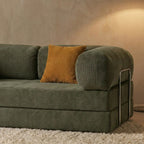 Détail du canapé cosy kaki confortable