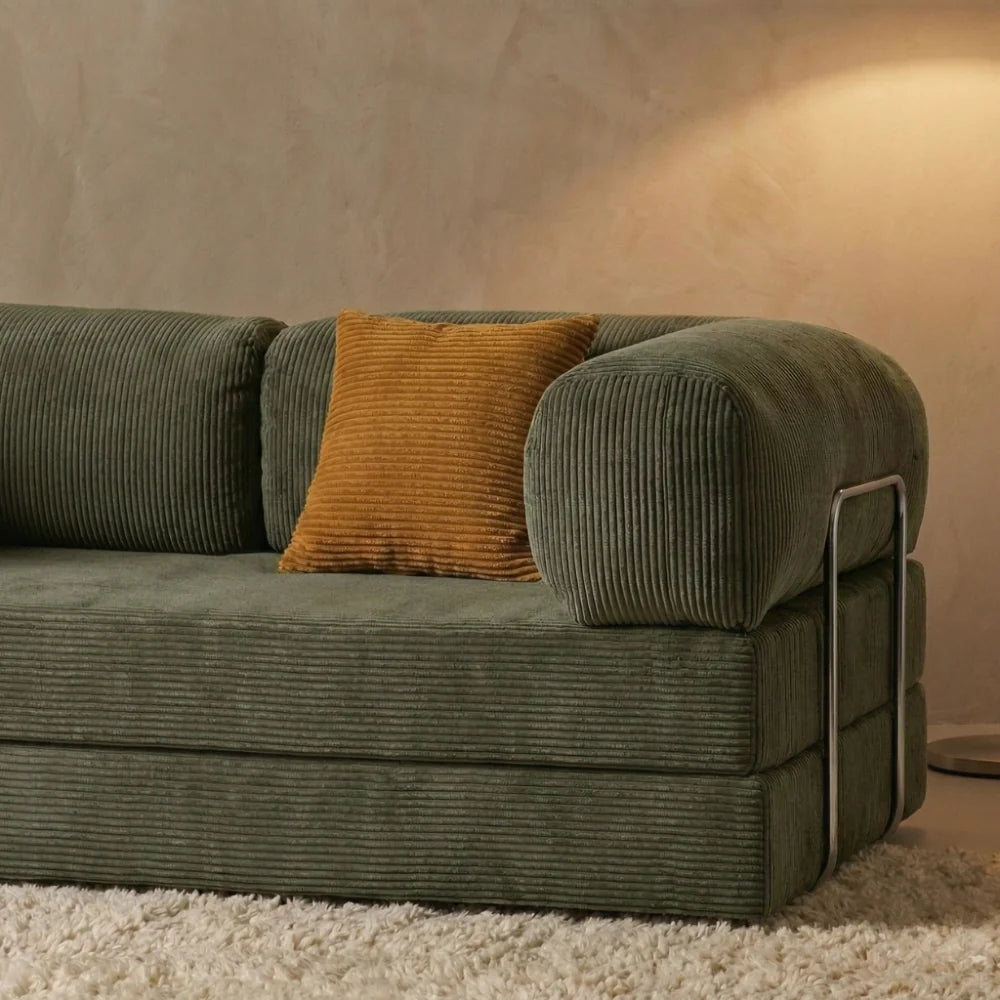 Détail du canapé cosy kaki confortable