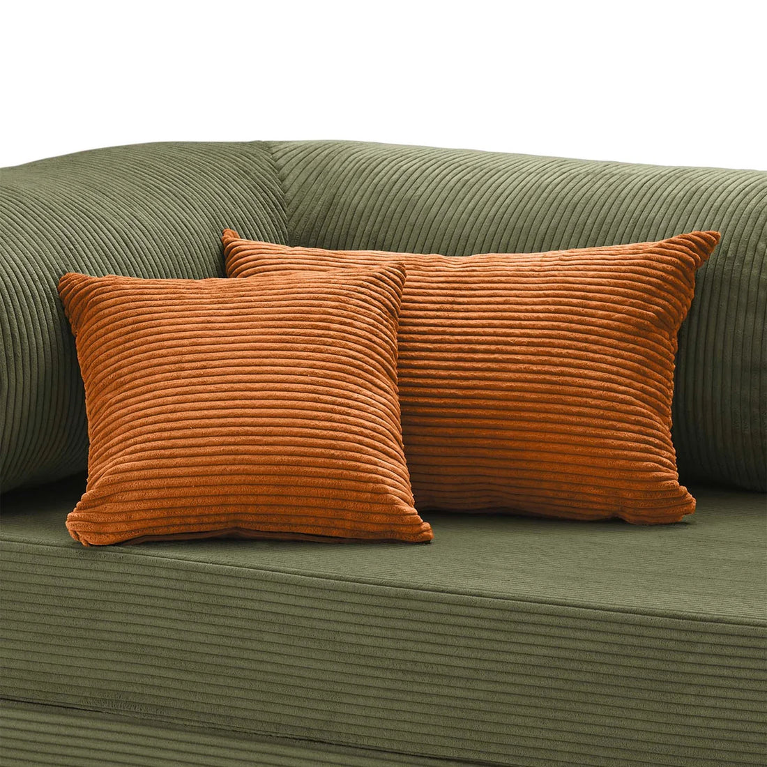 Coussin velours côtelé orange confortable Cocoonair sur canapé
