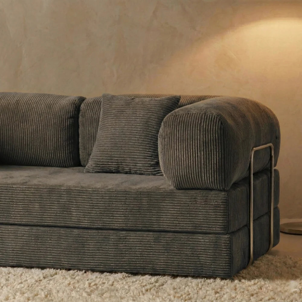 Détail du canapé cosy gris confortable