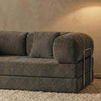 Détail du canapé cosy gris confortable