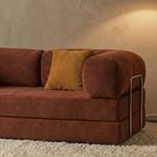     Détail du canapé cosy rouille confortable